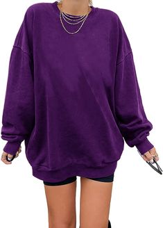 PRICES MAY VARY. Material:Cotton 90%，Spandex 10% Features:Drop Shoulder,Round Neck,Slight Stretch,Fashion and casual style,It's thick and really soft inside,True to Size, A sweatshirt that goes with everything. Occasion: Fashion Sweatshirts for women,suitable for Daily wear,sports,school,street wear,holiday and more. It's also a good gift to your friend or family. Match: Easy to pair with casual pants,jeans,shorts,sneaker,casual shoes to creating a fashion and pretty looking in spring, autumn an Oversized Plain Sweater, Purple Tops With Ribbed Cuffs, Oversized Long Sleeve Purple Top, Oversized Purple Long Sleeve Top, Oversized Trendy Solid Color Sweatshirt, School Street, Fashion Sweatshirts, Crewneck Sweatshirt Women, Oversize Sleeves