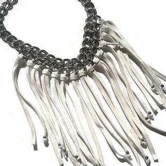 "The purchase of this listing includes one (1) Womens Leather Fringe Bib Choker Necklace with the following specifications: material: 10\" soft deerskin leather, 6mm antiqued silver metal bead chain: 18\" silver metal chain w/ 2\" extension closure: lobster claw clasp This unique necklace was designed with the carefree spirit in mind, and is meant to be worn with confidence and ease. The men and women's handcrafted jewelry at beryl blush blonde offers bold, unique custom made designer fashion je Leather Fringe Necklace, Leather Statement Necklace, Lover Necklace, Mens Beaded Necklaces, Turquoise Gold Ring, Spike Necklace, Rose Gold Bangle, White Fringe, Statement Bib Necklace