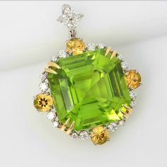 Brighten up your look with precious colours: Diamonds G/SI BR 0.116ct/20pc Peridot 3.80ct/1pc  Citrine 0.300/4pc Large - almost 4 carats - square peridot set in white gold and diamonds with four citrines.  Classic design, natural high-quality gemstones at very reasonable price. Mix and match with other designs. Free shipment by Fedex. Decouture is a Collection by Roman Zakharyan.  Long before he began designing jewellery, Roman Zakharyan was held by a fascination with minerals and coloured gems. Aged 30, he moved to Florence to study at the Metallo Nobile Jewellery School, turning his passion into a profession. The Tuscan capital remains as one of the few places in the world where artisans are still creating fine jewellery by hand. Following his graduation, and furthering his knowledge at Luxury Multi-stone Yellow Gemstones, Luxury Yellow Multi-stone Gemstones, Luxury Yellow Diamond Gemstones, Luxury Brilliant Cut Green Gemstones, Luxury Yellow Gemstones For Wedding, Elegant Yellow Diamond Gemstones, Luxury Yellow Gemstones For Formal Occasion, Elegant Multi-stone Peridot Gemstones, Fine Jewelry Peridot Gemstones For Formal Occasions