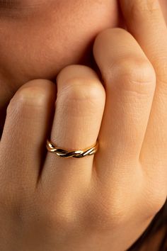 This classic braided gold ring is versatile and great for any occasion!  It's a romantic staple piece, that every outfit deserves to be paired with! Product ships from the USA within 1-3 days  If there's anything you're unsure of or would like to clarify, please don't hesitate to reach out. We'd be more than happy to assist you. Thank you for shopping with Daydreambasket! Please check out our store for more lovely products  https://etsy.me/3fv5TGq Follow us on Instagram @daydreambasket Elegant Twisted Stackable Rings As Gift, Adjustable Twisted Wedding Rings, Minimalist Twisted Gold Rings, 14k Gold Twisted Rings For Gift, Modern Twist Twisted Jewelry Gift, Twisted Gold Ring For Gift, Gold Twisted Promise Ring, Elegant Adjustable Twisted Ring, Twisted Yellow Gold Ring For Gift