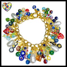 "Lovely colorful millefiori beads mixed with pearls and star charms make this bracelet a winner! So vibrant and bright you can't help but smile! I made this bracelet with: ~Glass millefiori beads ~Gold plated stainless chain ~Large lobster clasp ~Gold spacer beads ~Drop pearls ~Gold stars 7 3/4\" length with adjustment chain" Multicolor Heart Beads Charm Bracelet, Multicolor Pearl Charm Jewelry Gift, Multicolor Pearl Charm Jewelry As Gift, Multicolor Pearl Charm Bracelet, Multicolor Jewelry With Pearl Charm For Gift, Multicolor Jewelry With Pearl Charm As Gift, Adjustable Multicolor Bracelet With Pearl Charm, Multicolor Pearl Bracelet With Pearl Charm For Gift, Multicolor Charm Bracelet With Heart Beads As A Gift