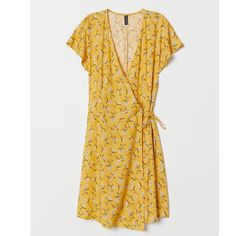 New W. Tag H&M Wrap Dress Yellow- Floral, 100% Viscose Material Size: 12 Casual Summer Floral Print Wrap Dress, Casual Summer Floral Wrap Dress, Casual Summer Wrap Dress For Day Out, Summer Yellow Viscose Dress, Yellow Viscose Summer Dress, H&m Yellow Beach Dress, H&m V-neck Midi Dress For Summer, Yellow Viscose Spring Dress, Fitted Viscose Wrap Dress For Summer