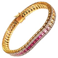 Multi- Coloured Sapphire 14.39 carats with Diamond 2.03 carats Bracelet in 18 karat Gold Settings Width: 0.7 cm Length: 21 cm Total Weight: 41.9 grams "We first opened doors in 1980 when it was then situated in the vicinity of the Victory Monument; a small and modest storefront with a couple of counters. From its humble beginnings to where it stands today, our company has proven its abilities as a jeweler. Since the beginning, we have been supplying fine quality pieces to dealers, wholesalers an Bracelet Tennis, Tennis Bracelet, Monument, Gold Bracelet, Jewelry Bracelets, Sapphire, Multi Color, Bracelet, Gold