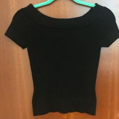 This Shirt Is Form Fitting And Lightweight Sweater Material. Looks Brand New. Black Fitted Knit Top With Short Sleeves, Black Fitted Knit Top Short Sleeve, Casual Fitted Black Blouse, Black Fitted Knit Top For Spring, Black Stretch Knit Top With Short Sleeves, Fitted Black Knit Top For Night Out, Chic Black Short Sleeve Knit Top, Casual Fitted Black Knit Top, Black Fitted Casual Knit Top