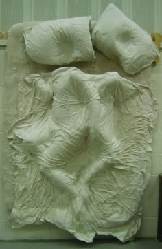 an image of a bed made out of sheets and pillows with the quote yoseh bhuj