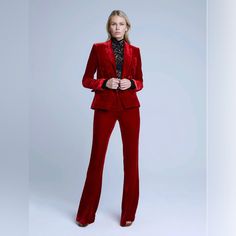 A Sumptuous Red Velvet Infused With A Touch Of Silk Gives This Classic Wide-Leg Pant A Touch Of Luxurious Glamor. Flatteringly Proportioned, High-Rise Style Hugs Through Contoured Waistband To Hips, Then Falls In A Wide, Flared Leg To Hem. Includes Belt Loops, Side Pockets, And Back Welt Pockets. Front Zip Fly Closure With Hidden Hook-And-Bar Closure. Purchased Three Weeks Ago And Worn For Two Hours At A Benefit. I Am 59 And These Pants Were Dangerously Long. With 4 Inch Heels They Dragged On Th Red Fitted Pants For Evening, Evening Fitted Red Pants, Luxury Red Fitted Bottoms, Luxury Fitted Red Bottoms, Elegant Red Formal Pants, Luxury Red Party Suits, Elegant Fitted Holiday Bottoms, Elegant Fitted Bottoms For Holiday, Luxury Red Evening Suits