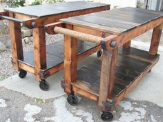 two wooden tables sitting on top of each other next to a stone flooring area