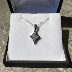 Get them a gift that is out of this world. Show them your love shines brighter than a star in the night sky. This meteorite star necklace in sterling silver will make the perfect gift for anyone who wants to add a cosmic twist to their attire. DETAILS OF THE PENDANT Metal: Sterling Silver Size: 16 mm x 12 mm Thickness: 3 mm Bail Size: 3 mm x 7 mm DETAILS OF THE CHAINMetal: Sterling SilverLength: 18″Width: 1.5 mmClasp: Spring Ring Silver Celestial Necklace For Her, Sparkling Silver Starburst Jewelry, Celestial Sterling Silver Necklace Gift, Celestial Sterling Silver Necklaces As A Gift, Celestial Sterling Silver Necklace For Gift, Star-shaped Engraved Necklace For Gift, Sterling Silver Star-shaped Engraved Necklace, Sterling Silver Necklace With Star Charm For Anniversary, Sparkling Celestial Sterling Silver Jewelry