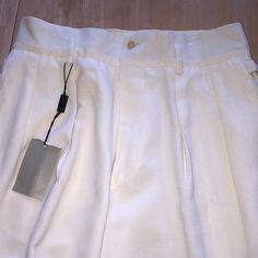 Classic Georgio Armani Trousers 35” Unfinished Length 9.5” Bottom Leg Measurement Loops For A Belt On The Waistband And Side Hip Buckled For Decoration Made In Italy High Waisted With Side Pockets 1 Outside Back Pocket One Of The Belt Loops (As Shown) Has Dark Mark On It White Straight Dress Pants With Belt Loops, Formal White Bottoms With Belt Loops, Tailored Summer Pants With Belt Loops, Formal Tapered Leg Summer Bottoms, Formal Summer Tapered Leg Bottoms, White Tapered Bottoms With Pockets, Fitted White Pants With Welt Pockets, White Pants With Welt Pockets For Summer, High Waist White Pants With Welt Pockets