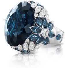 Indulge in pure luxury with the 18k White Gold Ghirlanda Couture Ring from Pasquale Bruni. This exquisite piece features a breathtaking London Blue Topaz gemstone that sparkles in the light, surrounded by a halo of diamonds that perfectly complement its blue hues. The ring's intricate design is reminiscent of delicate garlands, creating a truly unique and timeless piece that exudes elegance and sophistication.Crafted from the finest 18k white gold, this ring is a true masterpiece of Italian craftsmanship, with every detail thoughtfully considered to create a piece that is both stunning and durable. The Ghirlanda Couture Ring is a perfect choice for any occasion, whether you're looking to add a touch of glamour to your everyday look, or to make a bold statement at a special event.With its t Pasquale Bruni, Diamond Birthstone, Jewelry Appraisal, London Blue Topaz, London Blue, Diamond Wedding Rings, Cocktail Rings, Jewelry Branding, Luxury Jewelry