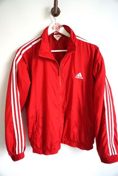 Jacket details: * Windbreaker ADIDAS Jacket * Zipper on front * 2 zipper pockets on front * Condition: Perfect vintage condition Measurements, laying flat: Length: 26" / 68 cm Armpit to armpit: 25 1/2" / 63 cm Cuff to Sleeve: 23" / 58 cm Label size: S  Feel free to message me with any questions Jacket Details, Adidas Windbreaker, Adidas Vintage, Vintage Adidas, Label Sizes, Windbreaker Jacket, Adidas Jacket, Sweat Shirt, Gender Neutral