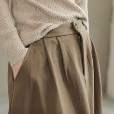 Details: Gender: Women Item Type: Skirt Material: Wool Season: Spring, Autumn Pattern: Solid Style: Casual, Loose, Retro Waist Type: Elastic Waist Size: One Size Waist: 64.00 - 84.00 cm/ 25.20 - 33.07 " Length: 77.00 cm/ 30.31 " Hip: 126.00 cm/ 49.61 " Hem: 184.00 cm/ 72.44 " Beige Winter Midi Skirt, Winter Beige Lined Skirt, Fall High-waist Khaki Skirt, Fall High Waist Khaki Skirt, High Waist Khaki Skirt For Fall, Fall Pleated Khaki Bottoms, Winter Midi Skirt In Solid Color, Pleated Khaki Bottoms For Fall, Khaki Pleated Bottoms For Fall