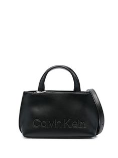 black faux leather grained texture tonal logo plaque magnetic fastening detachable shoulder strap two top handles zip-fastening compartment main compartment Calvin Klein Tote Bag, Chanel 2, Iconic Bags, Summer Beach Wear, Black Tote Bag, White Bag, Black Faux Leather, Pink Bag, Womens Tote Bags