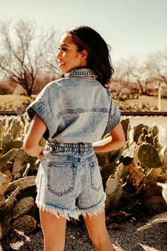 Our Distressed Denim Romper is perfect for all your summer concerts! This short sleeve light wash romper has an elastic waist and distressing in all the right places. Wear it with your favorite boots for the perfect summer-y cowgirl outfit! Casual Short Sleeve Denim Jumpsuit For Summer, Casual Light Wash Denim Jumpsuit With Short Sleeves, Medium Wash Short Sleeve Jumpsuits And Rompers For Spring, Spring Medium Wash Short Sleeve Jumpsuits And Rompers, Summer Short Sleeve Medium Wash Jumpsuits And Rompers, Spring Short Sleeve Medium Wash Jumpsuits And Rompers, Summer Short Sleeve Medium Wash Jumpsuit, Summer Washed Denim Jumpsuit With Short Sleeves, Washed Denim Jumpsuit With Short Sleeves For Summer