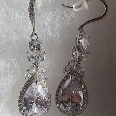 Mary St pierre added a photo of their purchase Classic Bridal Earrings With Sparkling Stones, Dazzling Elegant Bridal Earrings For Wedding, Dazzling White Gold Bridal Earrings For Wedding, White Gold Crystal Bridal Earrings For Wedding, Dazzling Bridal Earrings With Elegant Design, Sparkling White Gold Bridal Earrings For Wedding, Glamorous Pear-shaped Jewelry For Wedding, Elegant Sparkling Wedding Jewelry, White Gold Dangle Bridal Earrings For Wedding