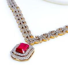 This exquisite 18k yellow gold necklace set, weighing 51.7 grams, features a luxurious design adorned with dazzling diamonds, vibrant rubies, and emeralds. The yellow gold finish enhances its elegant appeal, making it perfect for any special occasion. The set includes a necklace with a total diamond weight of 6.71 carats, featuring F-G color and VS quality diamonds. Ideal for those who appreciate high-quality craftsmanship and timeless beauty, this ruby and emerald diamond set is a cherished add Luxury Ruby Necklaces With Diamond Accents, Luxury Ruby Necklace With Diamond Accents, Formal Ruby Necklace With Hallmark, Formal Gold Plated Emerald Necklace, Elegant Yellow Gold Hand Set Emerald Necklace, Luxury Ruby Diamond Necklace With Diamond Accents, Luxury Diamond Emerald Necklace With Elegant Design, Luxury Ruby Diamond Necklace With Accents, Gold Plated Emerald Necklace For Formal Events