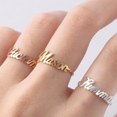 "** STACKABLE NAME RING - MEGAN FONT, made from sterling silver and available in 18k gold plated. This ring can be personalized with names (up to 10 characters/name)of your loved ones. Please note that the listing and the price is for an individual ring. I T E M ∙ D E T A I L S * Dimensions: Uppercase letters are approx. 5.5mm, lowercase letters are approx. 2.5mm * Character limits: up 10 characters * Material: Sterling silver * Color: Sterling silver, 18k Yellow gold-plated, 18k Rose gold-plate Personalized Gold Stackable Open Rings, Adjustable Personalized Gold Midi Rings, Adjustable Personalized Yellow Gold Midi Rings, Gold Adjustable Initial Ring With Custom Name, Adjustable Gold Initial Ring With Customized Name, Adjustable Name Jewelry For Promise Ring, Adjustable Gold Initial Ring In Sterling Silver, Adjustable Promise Ring With Name, Custom Name Nameplate Rings As A Gift