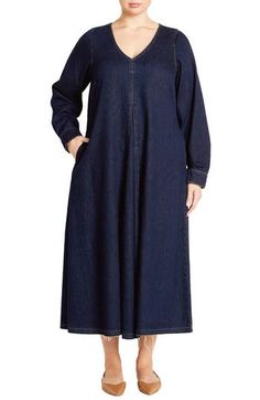 A versatile denim dress cut in a midi silhouette lends casual charm to your style with a flowy skirt and a raw, released hem. Slips on over head V-neck Long sleeves with button cuffs 96% cotton, 2% polyester, 2% viscose Machine wash, line dry Imported Casual A-line Denim Dress For Fall, Indigo Knee-length Relaxed Fit Denim Dress, Indigo Knee-length Denim Dress With Relaxed Fit, Indigo Relaxed Fit Knee-length Denim Dress, Casual Indigo Midi-length Dress, Casual Indigo Midi Length Dress, Casual Midi-length Dresses With Frayed Hem, Casual Indigo Midi Dress For Spring, Casual Dark Wash A-line Dress