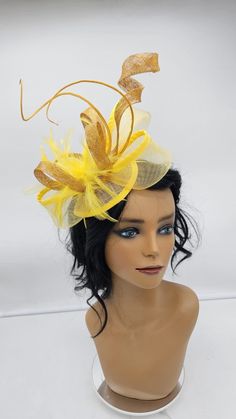 Elegant Yellow with gold Fascinator! Classic style to go with a variety of outfits: bridesmaids,  cocktail party,  Kentucky Derby, Rehearsal dinner, Easter and church outfits.  Ones with hair clip and headband.  - Rare find - Lightweight  - Ready to ship - Fast Shipping - Free Shipping - Group discount available - Customize by adding different color flowers and or feathers - Headband and Hair clip  CHECK OUT MY STORE FOR OTHER STYLES & COLORS: etsy.com/shop/Hatsandpearls Find more at my website for more styles: www.hatsandpearls.com  Reach out to me if you can't find what you are looking for.  I can make cake custom orders and help you style and match your outfit  Tag and share your pictures when you wear and style our hats.  Instagram: @hats_pearls Facebook: Hats Pearls Thank you for visi High-end Yellow Mini Hat For Kentucky Derby, Elegant Yellow Spring Fascinator, Elegant Carnival Evening Hair Accessories, Elegant Headpieces For Carnival Party, Gold Headband Fascinator For Summer, Yellow Summer Costume Hats And Headpieces For Races, Elegant Carnival Party Headpieces, Yellow Mini Hats For Spring Evening Events, Yellow Mini Hat For Summer Party