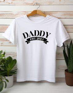 Father's day, Father's day gift, Father's day tshirt, Gifts for Dad, Funny shirt, Tshirt for Father's day, Dad gift, Gift for dads, Gift for boys, Gift for father, Dad, Dad joke, Dad jokes, personalised tshirt, Personalised  This is the perfect top for Father's day. Everything in the shop is made to order so if you want a different colour or size please contact me! Materials:   All top's are made from soft materials, this tee is 100% cotton for solid colours. Sports grey includes polyester (90% cotton, 10% polyester.) Features: -twill tape   -no side seams -The collar is made with ribbed knitting with seam -Made with 100% ring-spun cotton (4.5 oz/yd² (153 g/m Care instructions: -Do not dry clean  -Machine wash: warm (max 40C or 105F)  -Do not bleach  -Tumble dry: low heat -Iron, steam or d Boys Gift, New Dads, Dad Jokes, Twill Tape, Gifts For Father, Gifts For Boys, Funny Shirts, Fathers Day Gifts, Gifts For Dad