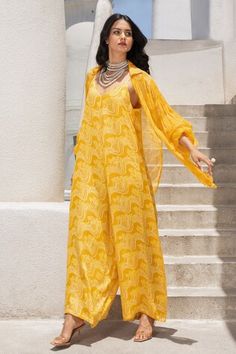 Marigold yellow jumpsuit with floral fantasy print. Paired with balloon sleeve printed shirt. - Aza Fashions Spring Sets With Blouson Sleeves, Festive Yellow Printed Sets, Fantasy Jumpsuit, Yellow Jumpsuit, Marigold Yellow, Printed Jumpsuit, Balloon Sleeves, Shirt Women, Yellow Floral