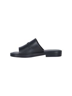 Ferragamo logo slide sandals in black rubber with open round toe, embossed logo detail on the top band, and slip-on design. Composition: 100% Rubber Classic Beach Slides With Rubber Sole, Classic Open Toe Slides With Rubber Sole, Casual Sandals With Embossed Logo For Summer, Logo Open Toe Slides For Beach, Casual Summer Sandals With Embossed Logo, Summer Slides With Embossed Logo, Logo Slides For Beach With Open Toe, Modern Sandals With Logo For Summer, Casual Slide Sandals With Logo