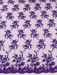 a purple and white lace with flowers on it