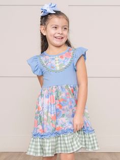 Get ready to turn heads in this playful Olive & Blue Watercolor Florals Ruffle Dress. The unique combination of olive gingham and watercolor florals will make your little stand out in any crowd. And with ruffles adding a touch of whimsy, she'll feel confident and stylish wherever she goes. Shop the sibling set! Fits true to size. Body: 97% Cotton / 3% Spandex Combo: 95% Polyester / 5% Spandex Accessories sold separately. Suggest bow color #61 and #66. Import. Henley is 46 inches tall and 52 lbs Playful Spring Dress With Flutter Sleeves, Playful Flutter Sleeve Spring Dress, Playful Spring Twirl Dress For Playdate, Playful Blue Ruffle Sleeve Dress, Summer Twirl Dress With Ruffles For Playtime, Playful Cotton Twirl Dress For Spring, Playful Ruffled Twirl Dress For Summer, Summer Playtime Twirl Dress With Ruffle Hem, Spring Flutter Sleeve Twirl Dress For Playdate