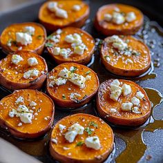 baked sweet potatoes with feta cheese on top