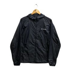 "Code : p/utc Vintage Columbia Windbreaker Men Black Jacket Large Columbia Usa Sportswear Company Jacket Sports Columbia Light Jacket Hoodie Embroidered  Size on Tag :  S Details Measurement  Arm Pit to Arm Pit : 19\"inches Back Collar to Hem : 27\"inches Condition :  Great Vintage Condition(Used Clothing).No Holes And No Stain.Please refer pictures detail.‼️" Vintage Columbia Jacket, Black Waterproof Hooded Jacket For Sports, Nylon Long Sleeve Sport Coat For Outdoor Activities, Techwear Long Sleeve Windbreaker For Hiking, Techwear Long Sleeve Track Jacket For Outdoor Activities, Techwear Track Jacket For Outdoor Activities, Techwear Track Jacket For Outdoor, Black Waterproof Track Jacket For Sports, Sporty Waterproof Hooded Jacket For Sports