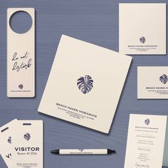 the stationery is laid out and ready to be used for business cards, envelopes, and other items