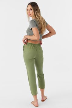 Ready for anything woven pant that has a lightweight, comfortable feel, solid color wash and elastic waist with drawcord. O'Neill Women's woven pant 27 1/2" inseam length 10 3/4 Front rise Elastic waistband with drawcord Straight leg fit 100% Viscose twill Green Pull-on Pants For Loungewear, Casual Solid Cargo Pants For Loungewear, Casual Loungewear Cargo Pants, Green Tapered Leg Sweatpants With Elastic Waistband, Casual Green Mid-rise Pants, Solid Color Summer Cargo Pants For Loungewear, Summer Loungewear Cargo Pants With Elastic Waistband, Relaxed Spring Joggers With Elastic Waistband, Green Relaxed Fit Cropped Bottoms