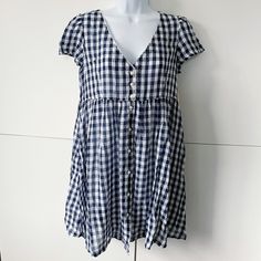 Adorable Lightweight Gingham Baby Doll Dress From Denim & Supply By Ralph Lauren. I Purchased This Nwt But Didn’t Try It On Until After I Had A Baby And The Bust Did Not Fit. This Is An Extremely Lightweight Fabric Which Means There Is Some Pulling/Loosening At Seams. Must Be Cared For Delicately. I’ve Taken Some Photos For Reference. This Is Still New With Tags But Does Show Threads And Seen In Photos. Size Medium Approx 18.5” Flat Pit To Pit And Approx 33” Long. Cute Short Sleeve Plaid Dress, Cute Cotton Mini Dress For Picnic, Casual Plaid Short Sleeve Dress With Buttons, Casual Short Sleeve Plaid Dress With Buttons, Casual Plaid Dress With Short Sleeves And Buttons, Casual Blue Plaid Mini Dress, Casual Plaid Short Sleeve Dress For Picnic, Casual Short Sleeve Plaid Dress For Picnic, Casual White Plaid Short Sleeve Dress