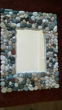 there is a mirror made out of rocks