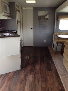 the interior of an rv is clean and ready for us to use