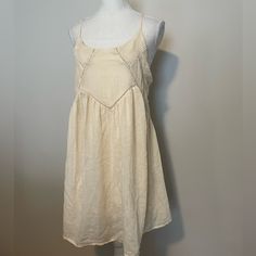 Cream Colored Dress. Brand New With Tags !! Super Cute Solo, Over A Bathing Suit At The Beach, Or Dressed Down With Some Sneakers And A Jean Jacket!! Size Small. Chest 17” Length 34” 2288 Daytime Linen Sleeveless Sundress, Sleeveless Linen Sundress For Daytime, Linen Sleeveless Sundress For Daytime, Cream A-line Midi Dress For Beach, Bohemian Sleeveless Mini Dress For Daytime, Sleeveless Linen Daytime Dresses, Lined Spaghetti Strap Dress For Daytime, Daytime Spaghetti Strap Lined Dress, Daytime Flowy Mini Dress With Spaghetti Straps