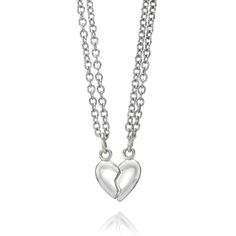 This best friend puffy heart pendant set is meant to be shared. Two necklaces are included in this set: one for you and one for your BFF. To preserve the polish of your sterling silver, avoid exposure to household cleaning products, bleach and other strong chemicals. Sterling Silver Necklace With Heart Charm For Best Friend, Heart-shaped Sterling Silver Friendship Jewelry, Sterling Silver Heart Pendant Necklace For Friendship, Sterling Silver Heart Jewelry For Friendship, Sterling Silver Heart Necklace For Best Friend, Silver Double Heart Necklaces For Friendship, Silver Heart Necklace For Friendship, Silver Heart Charm Necklace For Friendship, Silver Charm Necklace With Heart Pendant