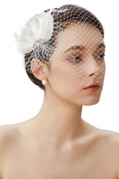 PRICES MAY VARY. Material: Feathers, crystal rhinestones, alloy and veil. Size: One size fits most with removeable mesh veil. Design:Fluffy feathers contrasting sparkling rhinestones will show off your elegance, and the veil will definitely add hazy beauty to you. Features: Charming birdcage veil with comb on both sides for easy secure; Decorative rhinestones and feather hair clip is detachable from the veil and could be worn on anywhere on your head. Occasions: A great veil fascinator for weddi Fascinator Veil, Veil Fascinator, Veil Crystal, Fascinator Hair, Black Fascinator, Wedding Bridal Veils, Feather Fascinator, Feather Hair Clips, Feather Hair