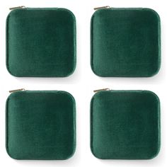 four pieces of green velvet covered jewelry cases