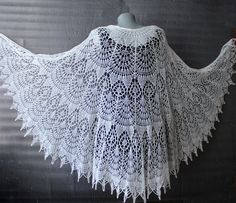 Cream shawl lace Bridal shawl wrap made with soft and cozy merino wool yarn in ivory(cream) color. *Handmade! *Size: lenght is about 35,4'' (90cm) width is about 78,7''(200cm) *Yarn: soft merino wool *Colours: ivory,black and other custom colours available Lightweight hand knitted shawl wrap is versatile item for any season and indispensable accessory for everyday life and for special occasions,is a perfect gift to friends or yourself This shawl has vintage vibe and looks great as a shawl cape with wedding gown in Victorian ,Boho,Gothic styles.You can made your own romantic style with this marvelous shawl! *Washing Instruction: I recommend gently hand wash in lukewarm or cold water with the addition of small amount of wool detergent.Lay flat to dry and block with pins if needed. White Crochet One-size Shawl, Handmade Cream Shawl One Size, One Size Crochet Lace Shawl, One Size Lace Shawl, Bohemian White Wraps For Wedding, White Crochet Lace Shawl One Size, White Crochet Lace Shawl, Bohemian Cream Knitted Shawl, Handmade One Size Shawl For Weddings