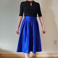 Miss Patina Royal Blue Satin Circle Pleated Skirt Size Small. Midi pleated skirt with pockets. Excellent condition. Zip back closure. 50s Inspired skirt. Made of polyester. Pleated Midi Skirt For Party, Fitted Accordion Pleats Skirt For Party, Fitted Pleated Midi Skirt For Party, Blue A-line Bottoms With Pockets, Midi Length Party Skirt, Knee-length Party Skirt With Pleated Waist, Solid A-line Bottoms For Party, Knee-length Bottoms With Accordion Pleats For Evening, Solid Midi Skirt For Party