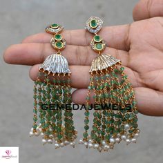 Emerald Beads Earrings, Pave Diamond Earrings, Pearl Beads Earrings, Emerald Silver Jewelry, 925 Silver Long Earring, Gold Plated Jewelry Gross Weight: 24.36 gram Gemstone Weight: 2.97 cts Diamond Weight: 0.75 cts Earrings Size: 103X14 MM NOTE:- All The Products Are Designed And Manufactured In My Workshop By Me & My Team. Shown Products Are Purely Handmade. Custom Orders Are Open Handly Accepted. We Are the Perfect Choice For Any Custom Jewelry Manufacturing. For Bulk Orders Please Message Elegant Pearl Earrings With Dangling Beads For Festivals, Elegant Latkan Earrings With Round Beads, Elegant Latkans Earrings, Elegant Dangling Beads Earrings For Festivals, Elegant Dangling Beaded Earrings For Festivals, Elegant Beaded Earrings With Dangling Beads For Festivals, Latkan Round Bead Earrings For Weddings, Elegant Polished Beads Earrings For Party, Elegant Party Earrings With Polished Beads