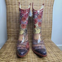 Corkys Western Rodeo Pointed Toe Rubber Rain Boots With Colorful Patterns. Waterproof With Functionality And Style. Colors Include Yellow, Red, Brown, White, Peach. Size Usa: 10 Size Euro: 40 Heel Height: 2 1/4" Condition: New Without Tags White Summer Festival Boots, Multicolor Bohemian Boots For Spring, Bohemian Multicolor Boots For Spring, Summer Floral Print Boots, Fitted Floral Print Summer Boots, Multicolor Floral Print Boots For Summer, Red Casual Boots For Festival, Multicolor Floral Print Summer Boots, Casual Red Boots For Festival