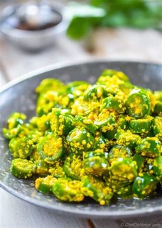 a close up of a plate of food with broccoli florets on it