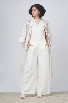 Ivory striped longline jacket with sakura prints Comes with flayer pant and inner slip. - Aza Fashions Chic White Outerwear With Floral Embroidery, Cream Sets For Workwear In Spring, Elegant Off White Sets For Spring, Chic Spring Sets With Set-in Sleeves, Off White Long Sleeve Sets For Spring, Longline Jacket, Types Of Work, Belted Jacket, Floral Jacket