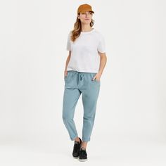 Go anywhere—or don't. These pants bring the lived-in softness of our classic (and much-loved) Crusher Tee to a stretchy, tapered pant that's perfect for wearing out—or wearing around the house. 92% USA Grown Cotton, 8% Spandex 7.08 oz. Mid-weight cotton/spandex jersey, garment washed for softness Elastic encased self waistband with drawcord. Slash pockets with self binding. Self turn-back cuffs. Life Is Good® twill patch. Size medium has a 26" inseam Imported | Life is Good Women's Solid Crusher Basic Relaxed Fit Bottoms For Everyday, Casual Solid Color Joggers For Everyday, Casual Solid Joggers For Everyday, Blue Casual Relaxed Fit Joggers, Casual Tops With Elastic Waistband, Casual Blue Relaxed Fit Joggers, Relaxed Fit Crew Neck Joggers For Leisure, Casual Bottoms With Comfort Waistband, Casual Tops With Pockets For Leisure