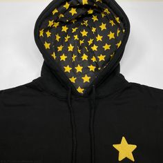 A perfect pairing to our official Steven Universe Varsity Jacket! 10oz. heavyweight fleece pullover hoodie. Embroidered front. Star patterned custom hood. Color: Black 80% Cotton / 20% Poly Fleece. Unisex. Please check size chart to ensure proper fit. Check out the rest of the Steven Universe Collection here. Winter Star Patch Sweatshirt For Streetwear, Cotton Sweatshirt With Star Patch For Streetwear, Winter Streetwear Sweatshirt With Star Patch, Black Star Print Sweatshirt For Winter, Black Hoodie With Star Print For Fall, Black Hoodie Sweatshirt With Star Print, Cotton Hoodie With Star Print, Streetwear Hoodie With Star Print, Black Star Print Sweatshirt For Streetwear