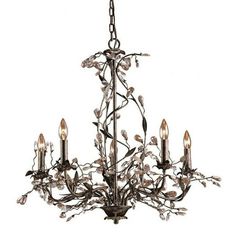 a chandelier with five lights hanging from it's center and leaves on the bottom