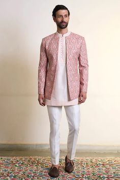 Peach bandhgala with all over mandala embroidery using vivid thread work. Paired with an inner kurta with embroidered collar, placket and straight pant. - Aza Fashions Pink Saree Matching Suit For Men, Fitted Pink Sherwani With Cutdana, Pink Fitted Sherwani With Cutdana, Fitted Pink Bandhgala For Diwali, Fitted Pink Bollywood Bandhgala, Pink Fitted Bandhgala For Diwali, Pink Fitted Bandhgala With Traditional Drape, Pink Fitted Bollywood Bandhgala, Fitted Pink Bandhgala For Festive Occasions