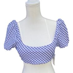 Brand: Raisins Department: Women's Size: L Condition: New With Tag Item: Swimsuit Top Style Name: Paris Top Pattern: Gingham Color: Blue And White Lined: Yes (White) Sleeve: Puffed Material: Made With Recycled Fibers Detail: Elastic Is Band, Shoulder, Arm And Neck Cups: Padded - Pads Not Removable Closure: Low Back With Tie Material: 84% Recycled Polyester 16% Spandex Care: Hand Wash Item Ships, Videoed, And Photographed With A 360 Security Tag In Place With Serial Number And Tamper-Evident Seal Fitted Summer Crop Top For Picnic, Summer Fitted Crop Top For Picnic, Fitted Crop Top For Summer Picnic, Blue Summer Top For Picnic, Blue Summer Tops For Picnic, Cute Blue Crop Top For Summer, Blue Fitted Top For Picnic, Trendy Blue Top For Picnic, Fitted Blue Top For Picnic